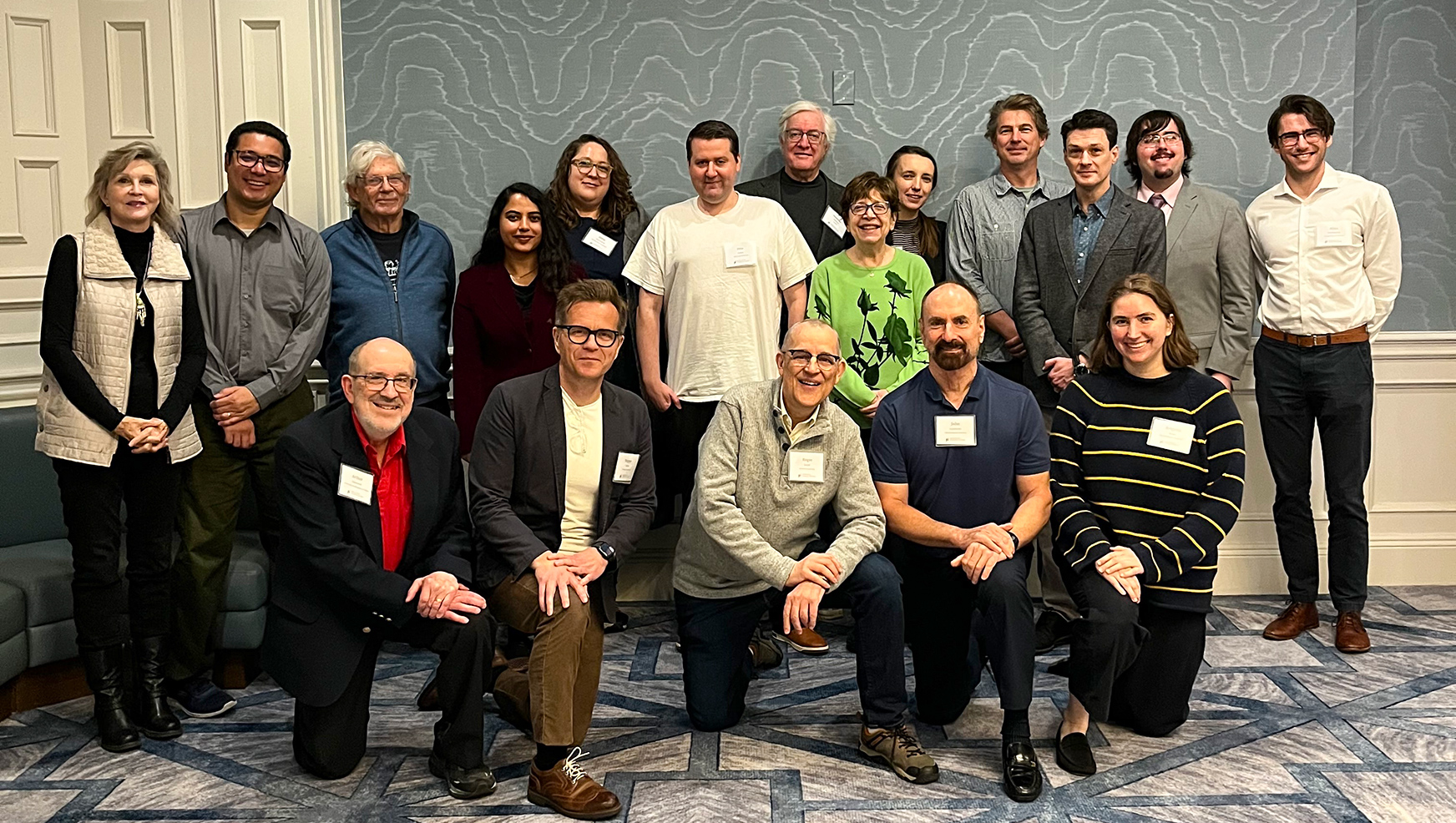 Group of faculty at IES workshop event.