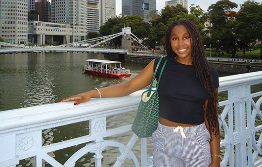 Laurenne Yomi Mvete posing on bridge in Singapore