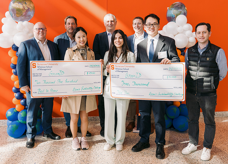 Winning students posing with judges and Dean McKelvie