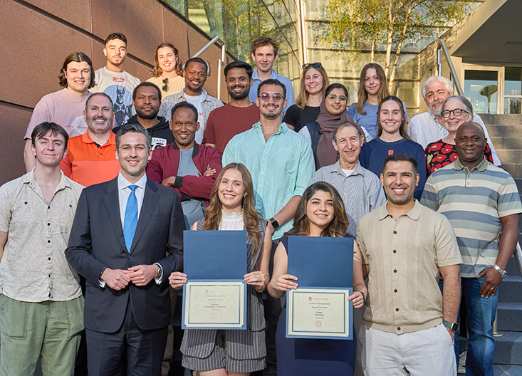 Graduating CASSE students with diplomas