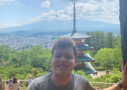 Student in front of Mt. Fuji