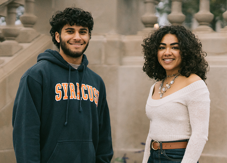 Two students posing on campus