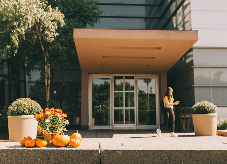 Whitman’s main entrance with pumpkins in foreground