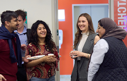 Guest mingle during the 2025 CASSE graduation