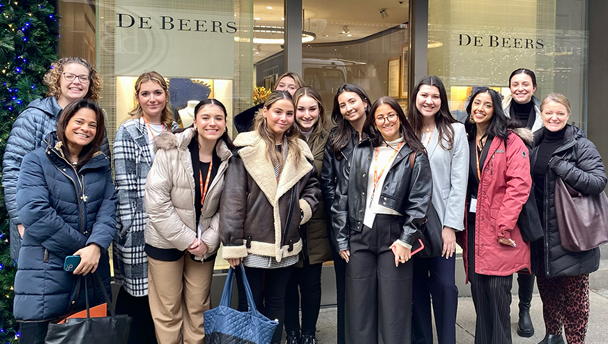 Betsy Hawley outside De Beers with Whitman students and staff