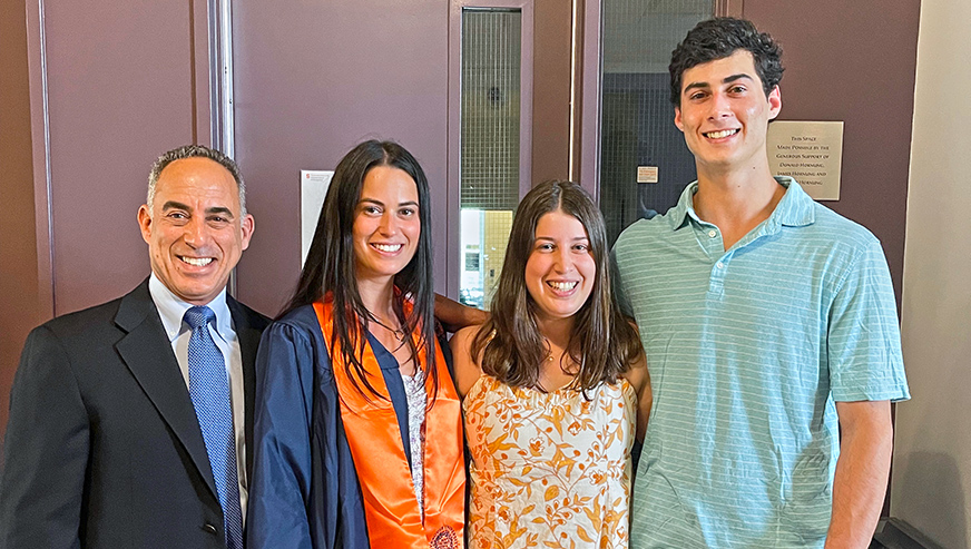 Bob Hornung and his children outside the Hornung Family Technology Center