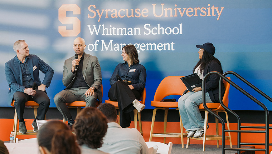 Panel on stage moderated by Indaria Jones