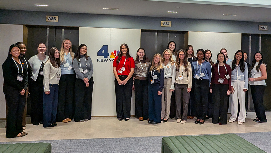 Students posing during their visit to NBC