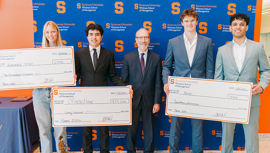 Three winning teams posing with Mr. Panasci