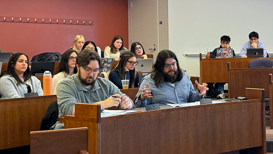 Brian Pope and  James Mehran judging the student presentations