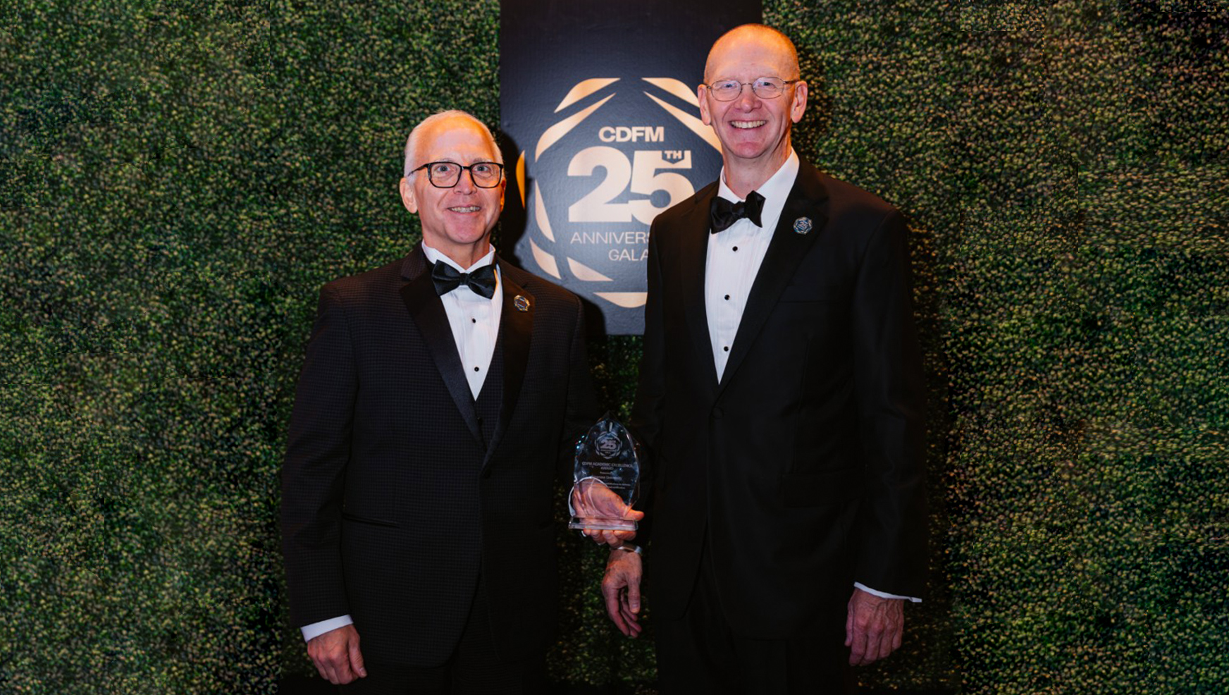 Tom Constable and Rich Brady posing during the award ceremony