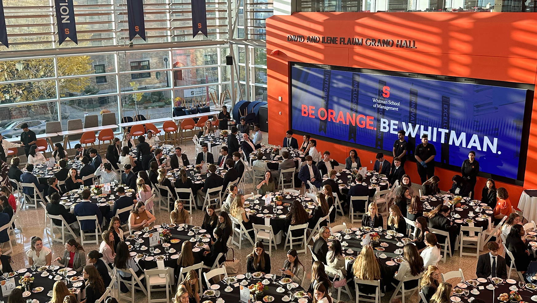 Flaum grand hall filled with students during an etiquette dinner