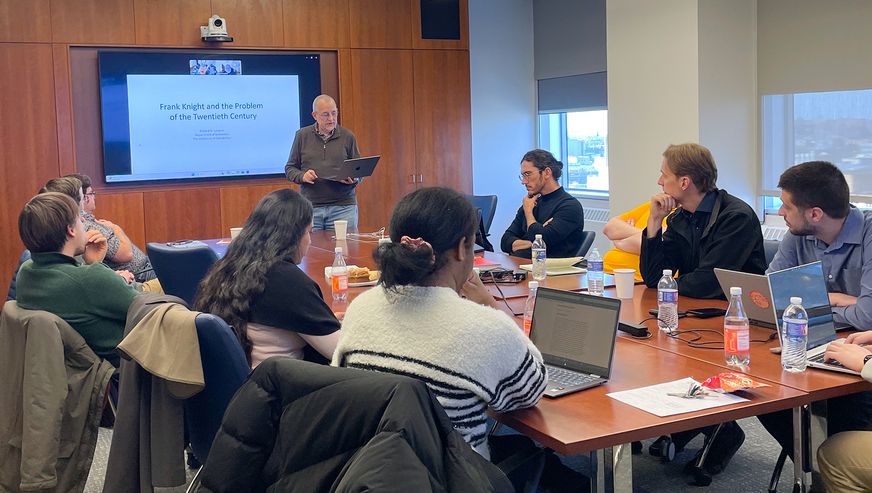 Professor Koppl presents to conference participants