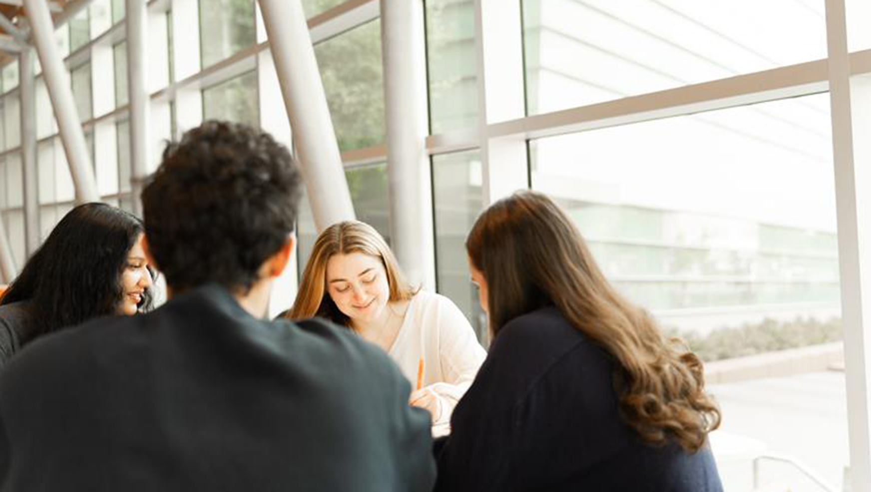 Four students studying in Flaum