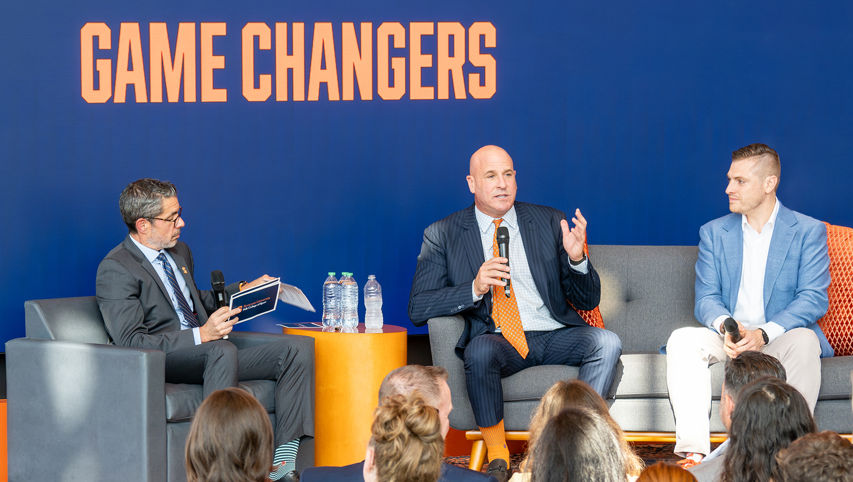 Falk College Dean Jeremy Jordan, Mike Levine and Kevin Belbey