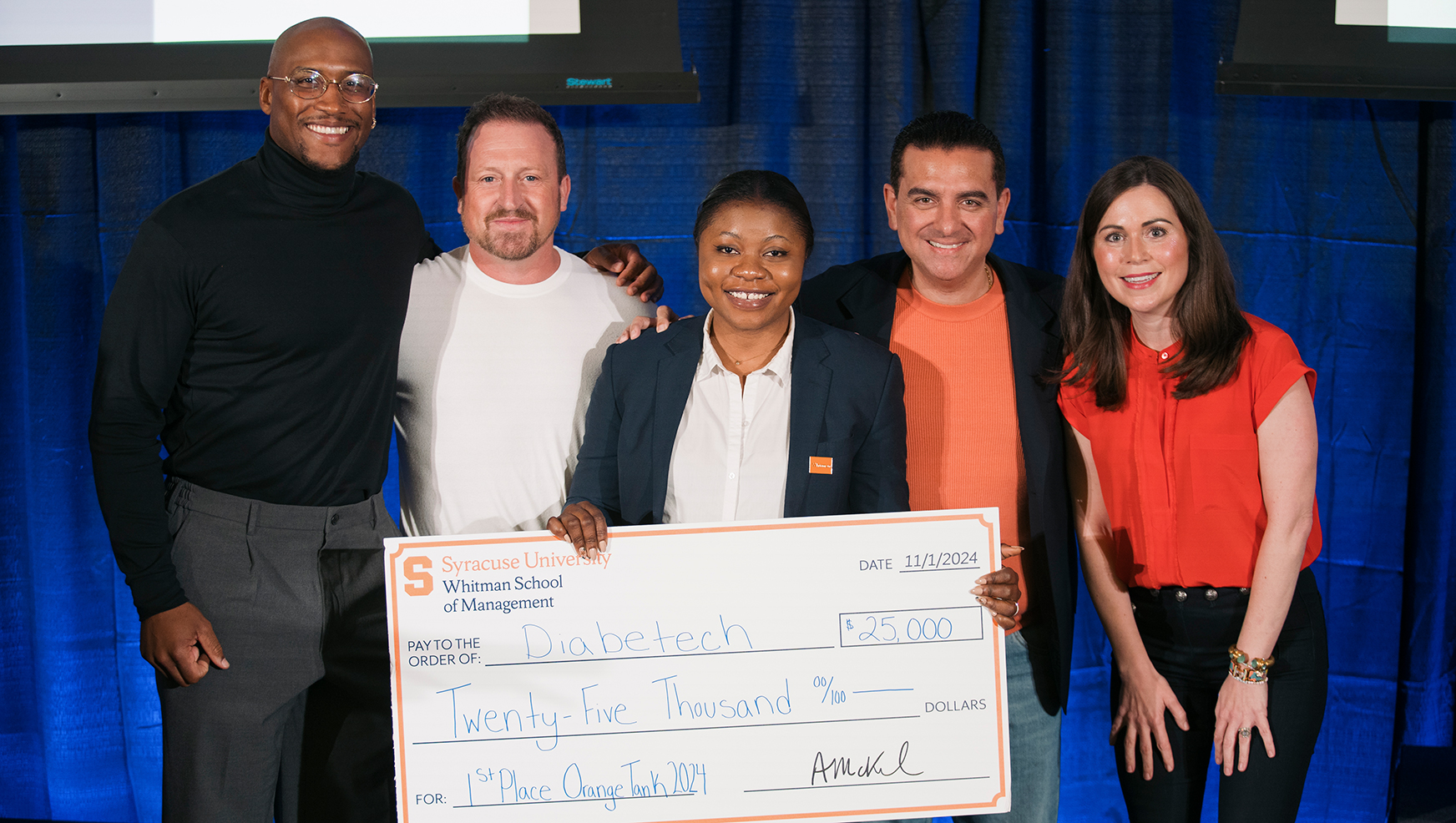 Derrell Smith, Vinny Lobdell Jr., Buddy Valastro and Stacey Tank posing with 1st price winner Tosin Alabi holding an oversized check.