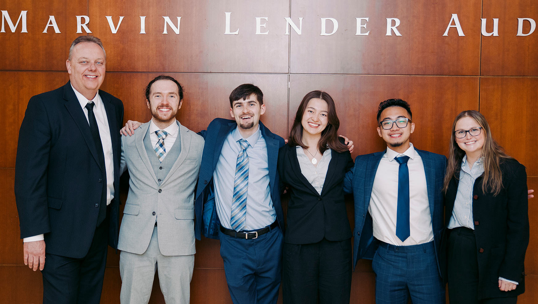 Professor Walsleben posing with students from one of his Capstone team