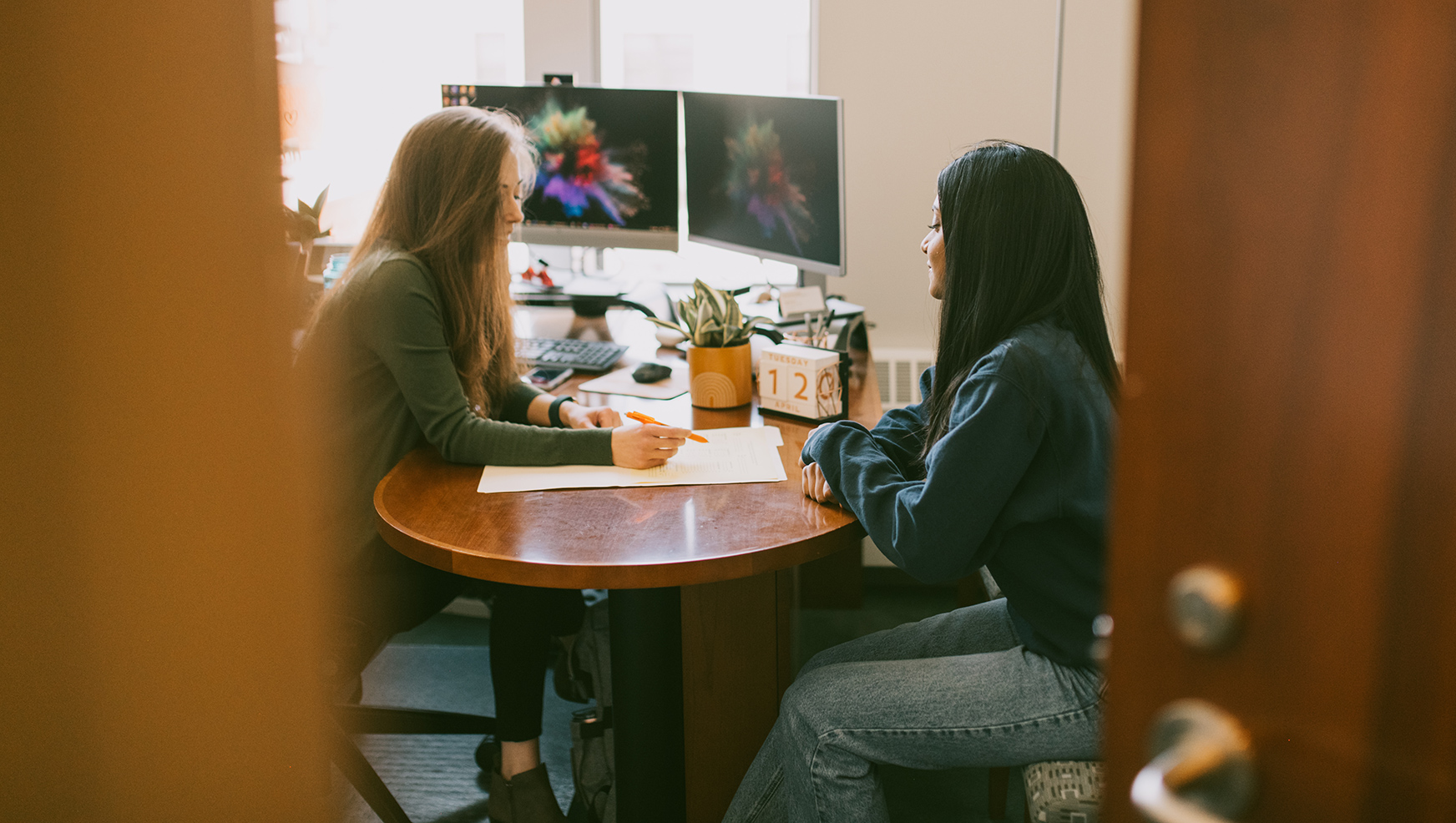 A career advisor works with a student at Whitman.