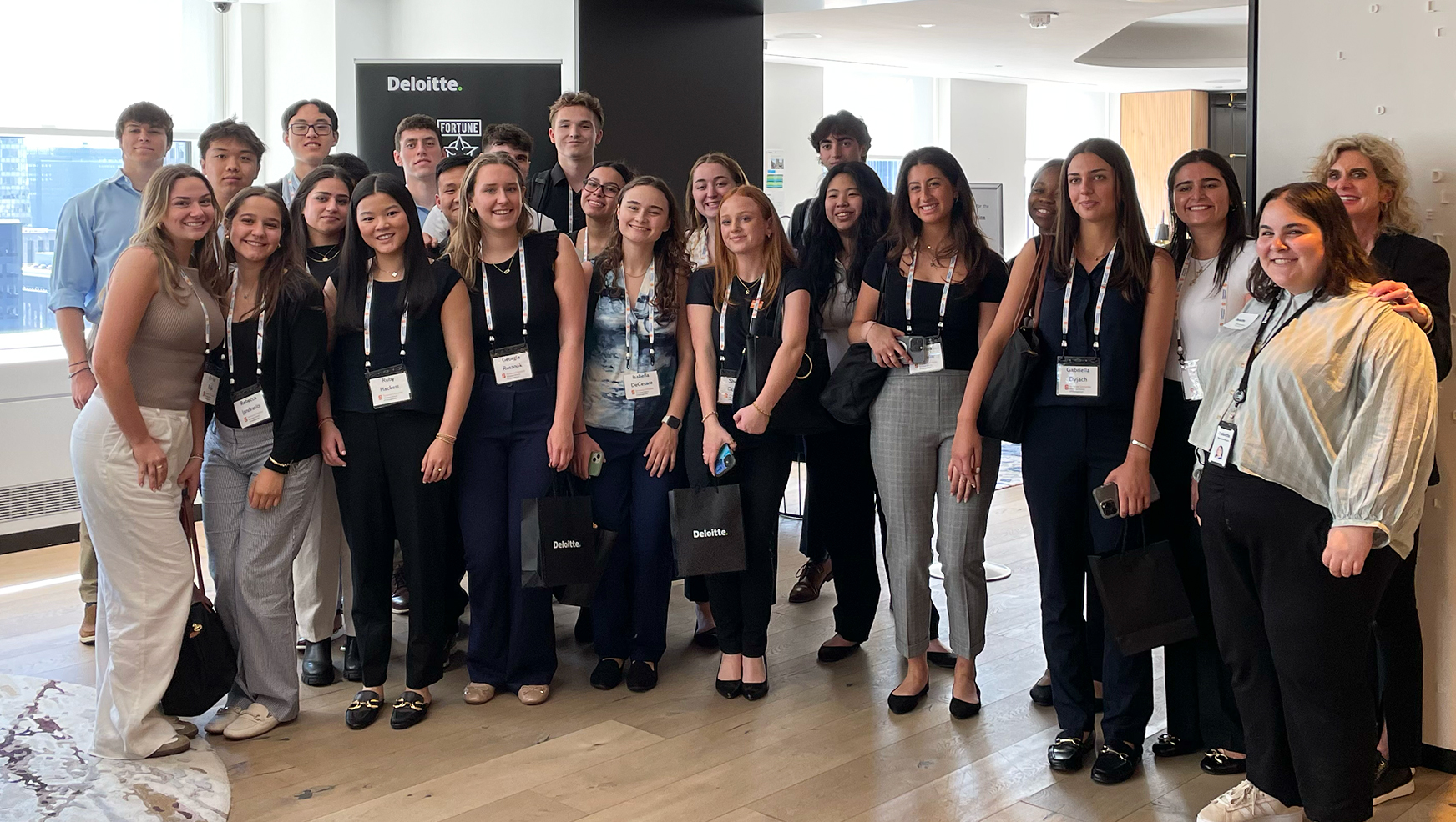 Students posing during a visit to Deloitte in NYC