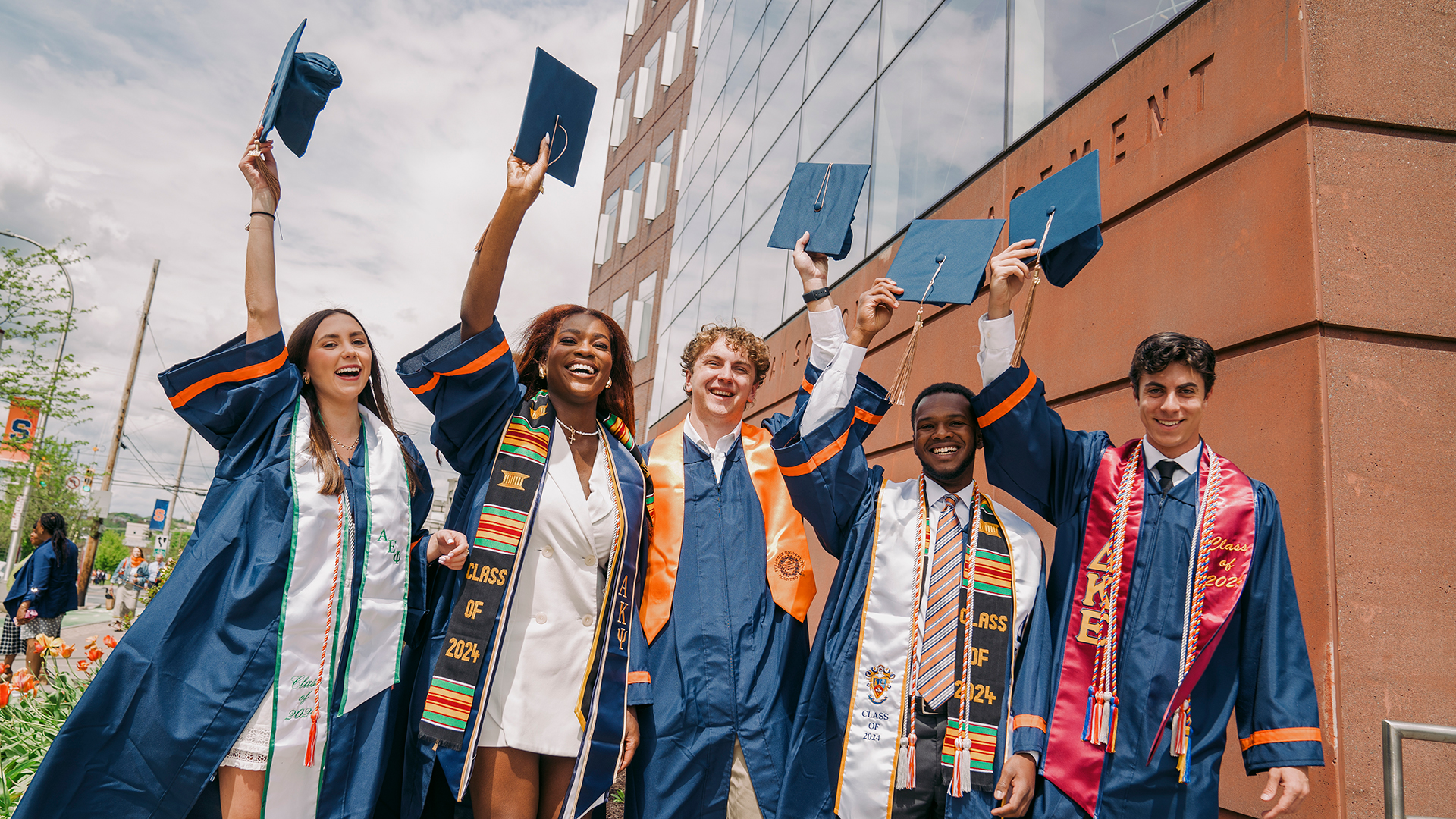 Students celebrating outside Whitman during the 2024 convocation