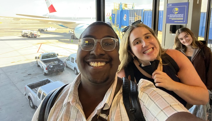 Two students in an airport
