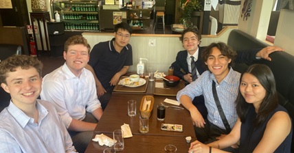 Whitman student eating in Tokyo