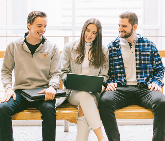 Faculty member working with students