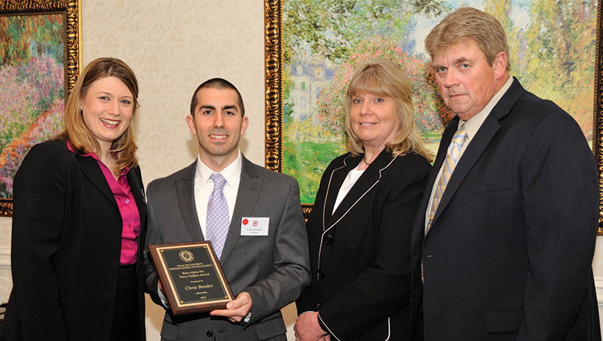 Amy Hellen and her parents giving out the Tracy Halpin Memorial Award