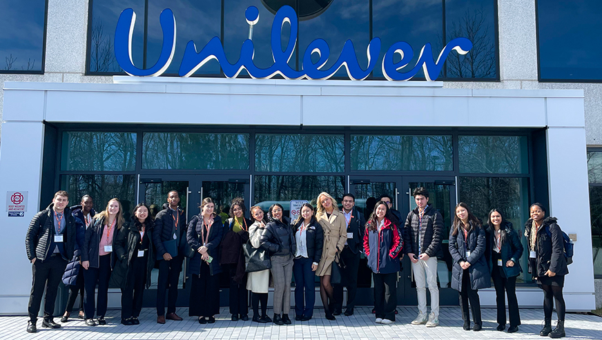 Students posing in front of the Unilever building