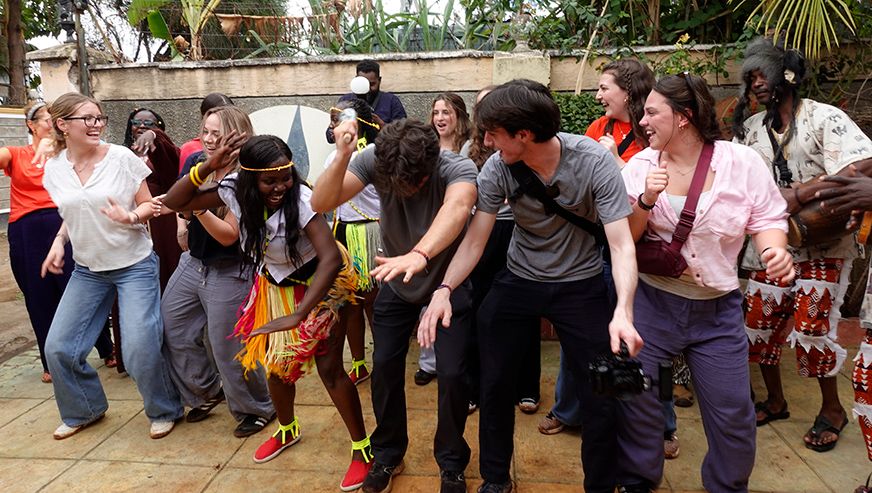 Students dancing with locals in Kenya