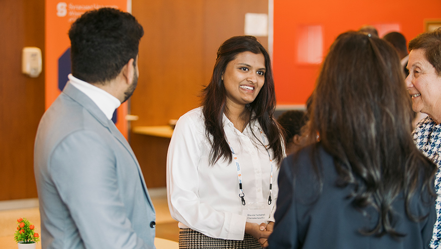 Student networking with alumni