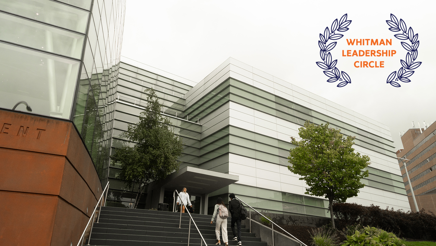 Whitman building and the Whitman Leadership Circle seal