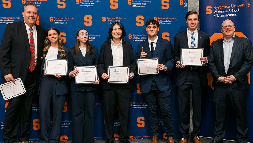 Professor Walsleben and Dean McKelvie posing with the winning Capstone team