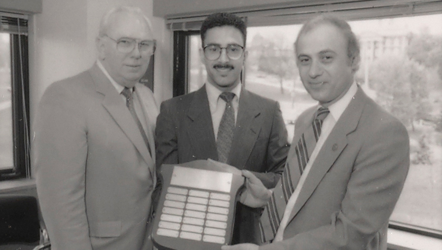 Peter Koveos, Mr Brethen and a student in 1990