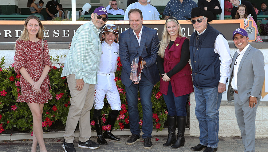 Bill Strauss posing after his horse won the Kentucky Derby