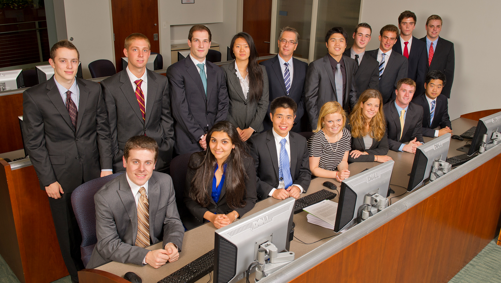 Orange Value Fund students and professor Diz in the Ballentine center