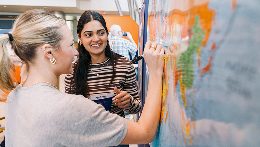 Students exploring the global pillar of the Experiential Center